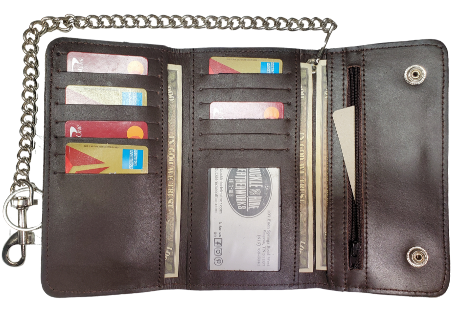 The "Charlie" is a popular Long Style Tri-fold Chain Wallet in a smooth chocolate brown. It's a thinned Cowhide LEATHER with nylon lining for a lighter weight and slimmer profile! Inside are 13 nylon lined card slots and an I.D. slot, 1 nylon lined zippered pocket, 3 underneath cash slots, for all your important stash. Complete with a 16" chrome plated chain. Size is 7" x 3 1/2" when snapped closed. Fully open is approx. 11 1/4" x 7". Like most wallets, over stuffing will limit the time of use. Imported