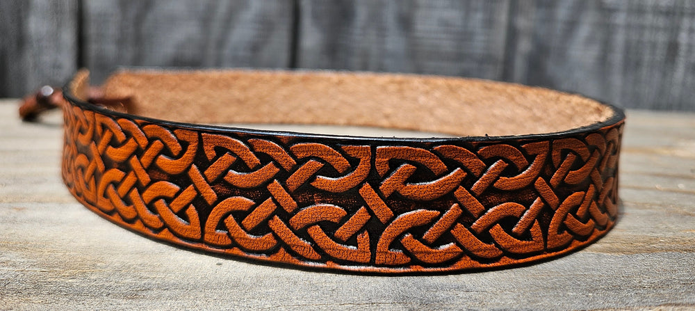 Our Celtic Western Styled Hatband is Hand Stained is 1" in width. It will up to up to size 7 1/2 hat. Fit's most any hat with adjustable bead and leather 1/8" string. Will fit most WESTERN crowned hats. Made in our Smyrna, TN. shop a short drive from downtown Nashville, TN.

1" wide
23" long (without tie string)
More colors coming soon