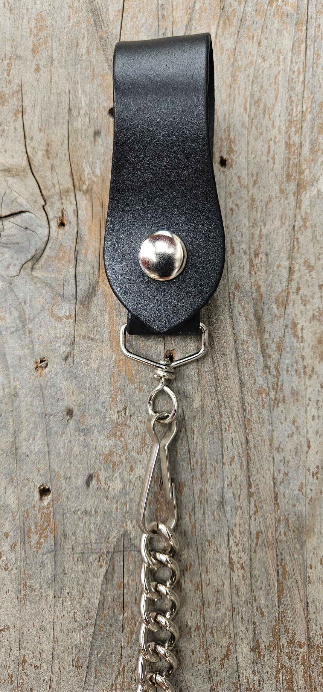 This Vintage style Steel Chain is Simple but Sturdy and will keep your wallet where it needs to be. The Leather loop attaches to your jeans and the split ring attaches to your wallet. Chrome plated. Ride down and get yours in our shop just outside Nashville in Smyrna, TN.

24" Chain Length