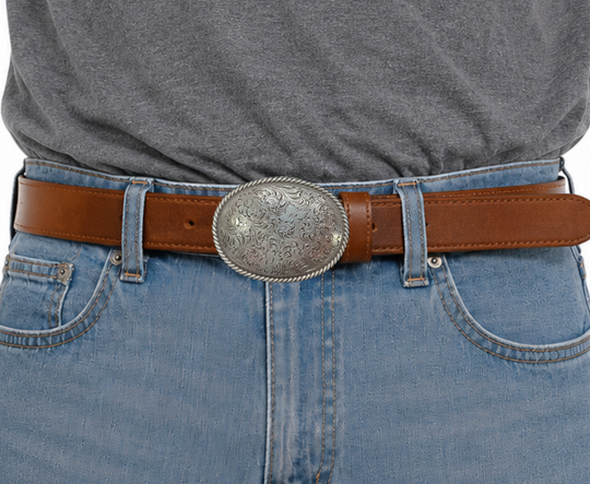 This oval shaped buckle by Nocona has a rope design around the border. It is chrome colored with scroll design etched appearance on surface.  Measures 2 3/4" tall by 3 3/4" wide and fits belts up to 1 1/2" wide.  It is available for purchase in our retail shop in Smyrna, TN, just outside Nashville and also on our online store. Made in Taiwan. Back of buckle pictured.