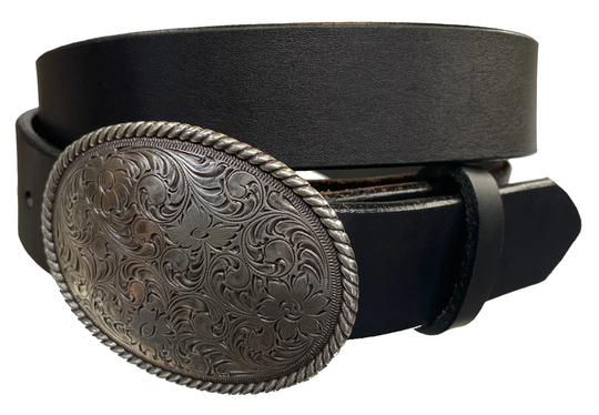 This oval shaped buckle has a rope design around the border. It is chrome colored with scroll design etched appearance on surface.  Measures 2 3/4" tall by 3 3/4" wide. Buckle is made in Taiwan. Belt is a solid strip of leather and made in our shop in Smyrna, TN, just outside Nashville. It is 1 1/2" wide and available in sizes 34"-44" and colors distressed brown, black, and dark brown.  It is available for purchase in our retail shop and online store. Distressed brown.