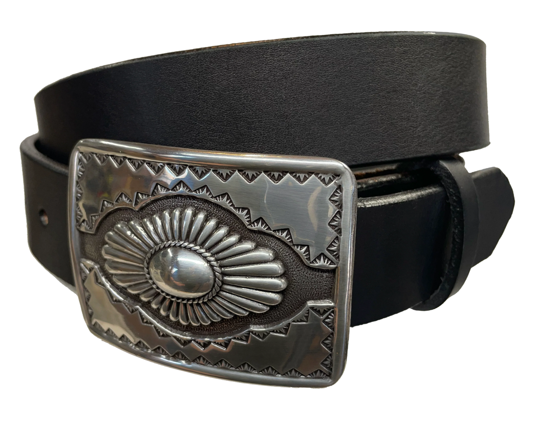 "The Cody" is a Western style belt buckle that will add a classic western look to your belt. ﻿CHOOSE ONE BELT STRIP COLOR! ﻿The belt is made from a single strip of leather in our shop in Smyrna, TN, just outside Nashville. The buckle is imported. ﻿Available in our retail and online shops. Black.