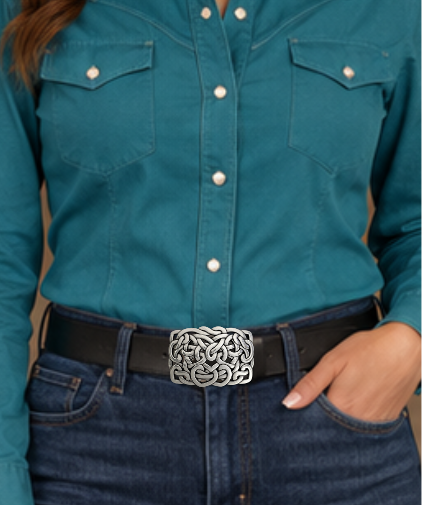 Get lost in the intricacy of Celtic and Nordic Knot patterns. These interconnected designs have their origins in Celtic culture, symbolizing the interconnectedness of all things. With their continuous and flowing lines, they have no beginning or end. Perfect for belts up to 1 1/2 inches. Come visit our store in Smyrna, TN, just a Knot away from downtown Nashville!

Approx. 3" x 4"
Imported