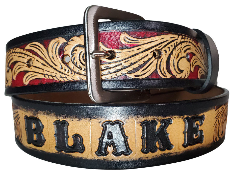 This DELUXE Rustler Name Leather Belt features a classic western Scroll pattern embossed on a 9-10 oz. vegetable-tanned cowhide. You may customize the buckle with the added snaps. It is named Deluxe because of the additional color added to the background of the pattern. This product is crafted with care in our Smyrna, TN shop, just outside Nashville, TN.