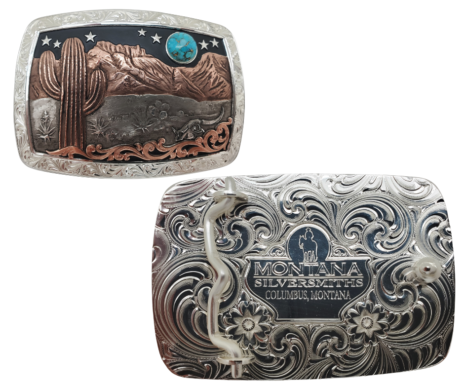 A Southwest buckle that's not so big! This 99% Silver rectangular belt buckle has Scroll work around the outer edge with a 18 karat Rose Gold Cactus, Mountains and a Turquoise Moon over the Desert scene. It's size is approx. 3" across x 2 1/2" tall and fits 3 3/4", fits up to 1 1/2" belts. Available at our Smyrna, TN just a short drive from downtown Nashville. Made by Montana Silversmith.