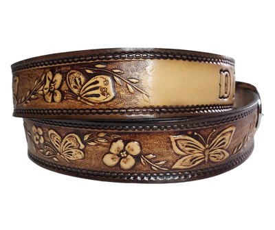  This Western styled leather Kid's belt features beautiful Flowers and Butterfly pattern that is sure to draw attention. The easy-change metal buckle makes for comfortable wear and makes it easy to add your own buckle. Perfect for adding a unique touch to any Kid's wardrobe. This belt is stocked in our shop outside Nashville in Smyrna, TN.