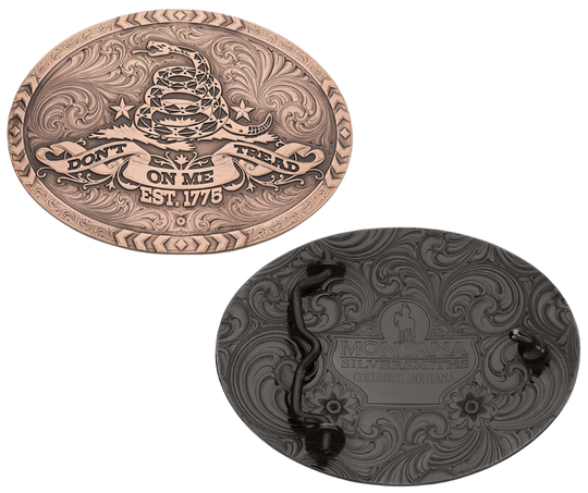 The 1776 Declaration is a Vintage Bronze Gadsden Belt Buckle. This oval buckle features a bronze tone finish. The words "Don’t Tread on Me" are featured prominently on curling ribbon at the bottom of the buckle. The Gadsden rattle snake sits ready to strike in the center of the buckle for a bold look. Chevron designs border the top, bottom, and sides giving the buckle a militant feel. Approx 4"x3" Standard 1.5 inch belt swivel. Get yours at our local Smyrna, TN not far from Nashville.