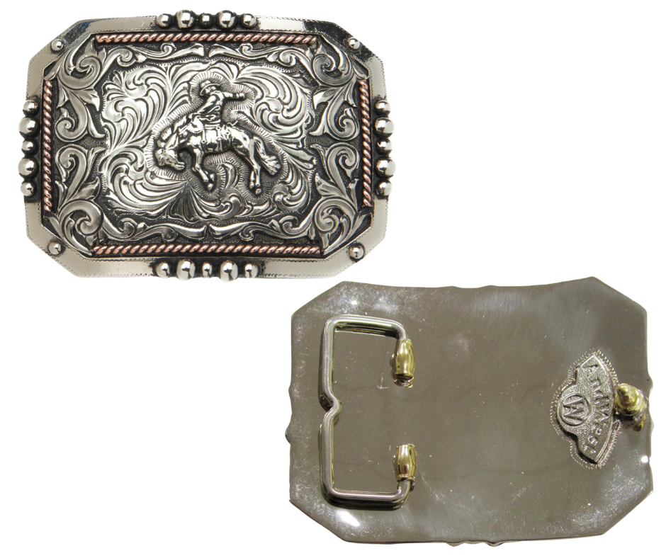 If your in rodeo you know a drop makes for a more difficult ride! This buckle is full on Western with accents of copper and a partially beaded edge, measuring 4" in width and 2 7/8" in height to fit belts up to 1 3/4" wide. Visit our shop in Smyrna, TN, conveniently located near downtown Nashville, to discover this and other one-of-a-kind belt buckles.