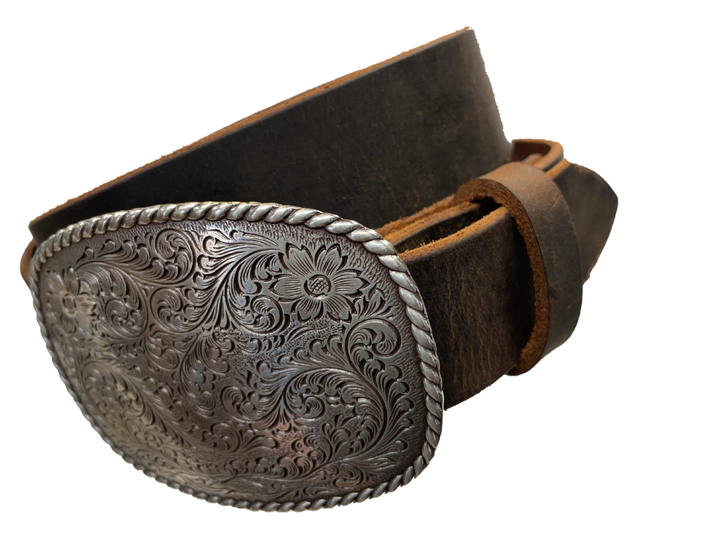 This rectangular shaped buckle has rounded edges with rope design around the border. It is chrome colored with scroll design etched appearance on surface.  Measures 2 3/4" tall by 3 3/4" wide and fits belts up to 1 1/2" wide. Buckle is made in Taiwan. Belt is a single strip of leather that is 1 1/2" wide and available in sizes 34" to 44". Colors are distressed brown, black, and dark brown. Available online and in our shop in Smyrna, TN, just outside Nashville.
