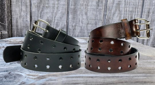 This solid strip of top grain leather has a satin finish surface, and a width of 1 1/2". Will soften with normal wear. Sizes available are 34" to 44" from buckle end to hole most worn. Features double holes the entire length of the strap! The roller buckle is easy on the leather, protecting the strap from undue creasing and scratching. Chrome plated buckle is stitched to leather strap. One of a few USA made belts not produced in our Smyrna TN shop. Made in USA