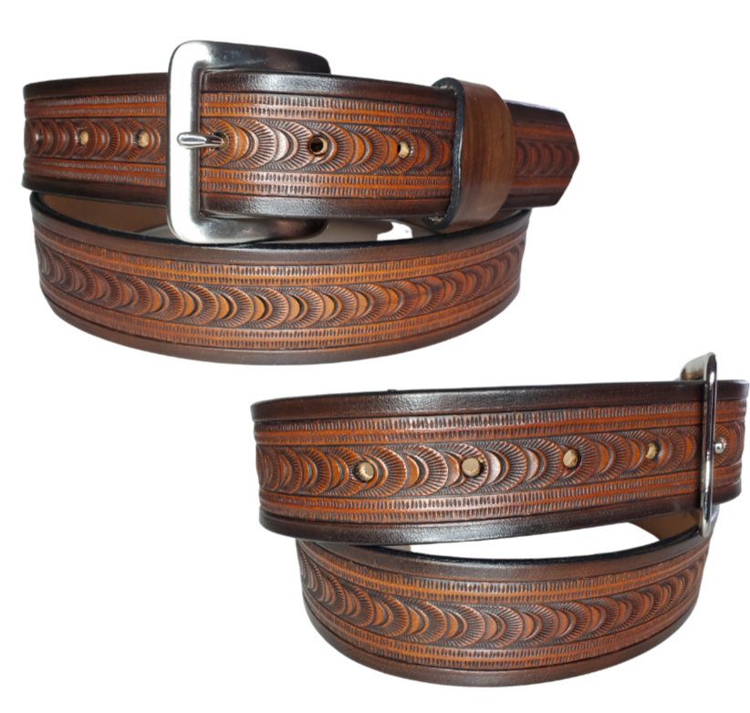 "The East Ridge" handmade all leather belt is made from a single strip of Veg-tan cowhide. The hand finished Veg-tan that is 9-10 oz., or approx. 1/8" thick in 3 color options.  The width is 1 1/2". The antique nickel plated solid brass buckle is snapped in place. This belt is made just outside Nashville in Smyrna, TN. Perfect for casual and dress wear, it can be for personal use or for groomsman gifts or other gifts as well.