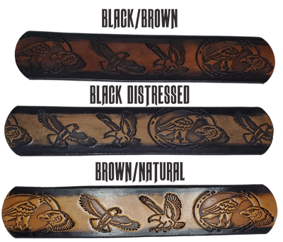 "The "Where Eagles Dare" is a handmade real leather belt made from a single strip of cowhide shoulder leather that is 8-10 oz. or approx. 1/8" thick. It has hand burnished (smoothed) edges and a 3 types of Eagles pattern. This belt is completely HAND dyed with a multi step finishing technic. The removeable antique nickel plated solid brass buckle is snapped in place with heavy snaps. Type Name or No Name in the Name box. This belt is made just outside Nashville in Smyrna, TN.