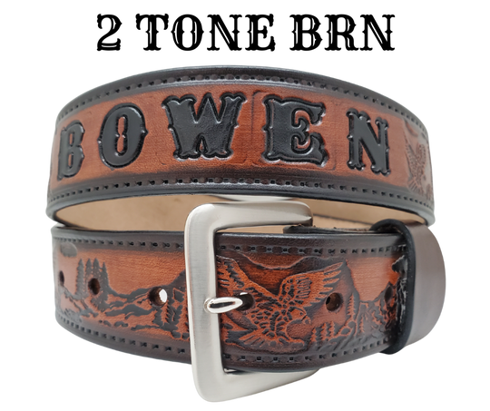 Get ready for an unforgettable climb to the top with The "Eagle Mountain" Name Belt! This one-of-a-kind belt features a 1 1/2" width and is hand-stained with a strip of vegetable tanned leather. The bold design includes a embossed Stitch border and Eagle center pattern, while the solid brass buckle in antique nickel finish adds a touch of ruggedness. Handcrafted at our shop in Smyrna, Tennessee, just outside Nashville.