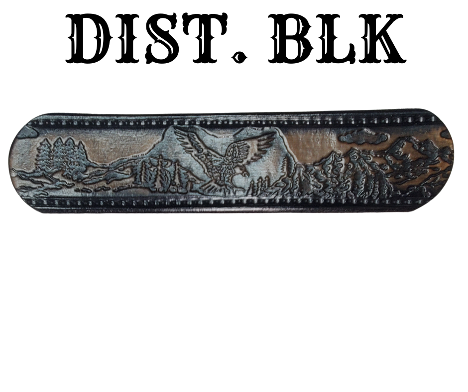 Get ready for an unforgettable climb to the top with The "Eagle Mountain" Name Belt! This one-of-a-kind belt features a 1 1/2" width and is hand-stained with a strip of vegetable tanned leather. The bold design includes a embossed Stitch border and Eagle center pattern, while the solid brass buckle in antique nickel finish adds a touch of ruggedness. Handcrafted at our shop in Smyrna, Tennessee, just outside Nashville.