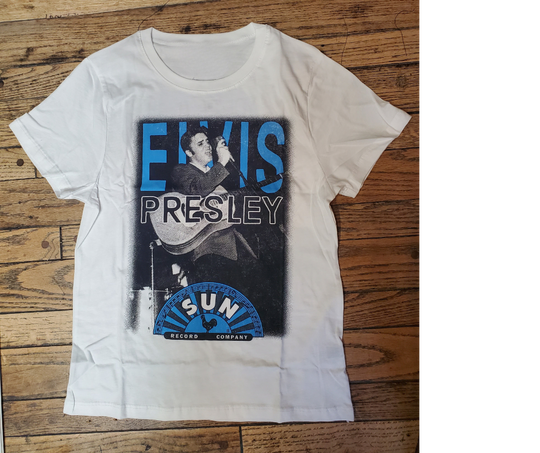 The Elvis Heartbreaker tee has those vintage style graphics. It'll take you back to those Comeback special and the cool Rhinestone Jumpsuits. Supper soft feel. A few left in stock at our Smyrna, TN shop.

Sizing measurements:
Chest under arm pit S-16", M-17", LRG 18", XL-19", 2X- 20"
Length top of neck to bottom of shirt S -24, M-25", L-26", XL-27", 2X-28"