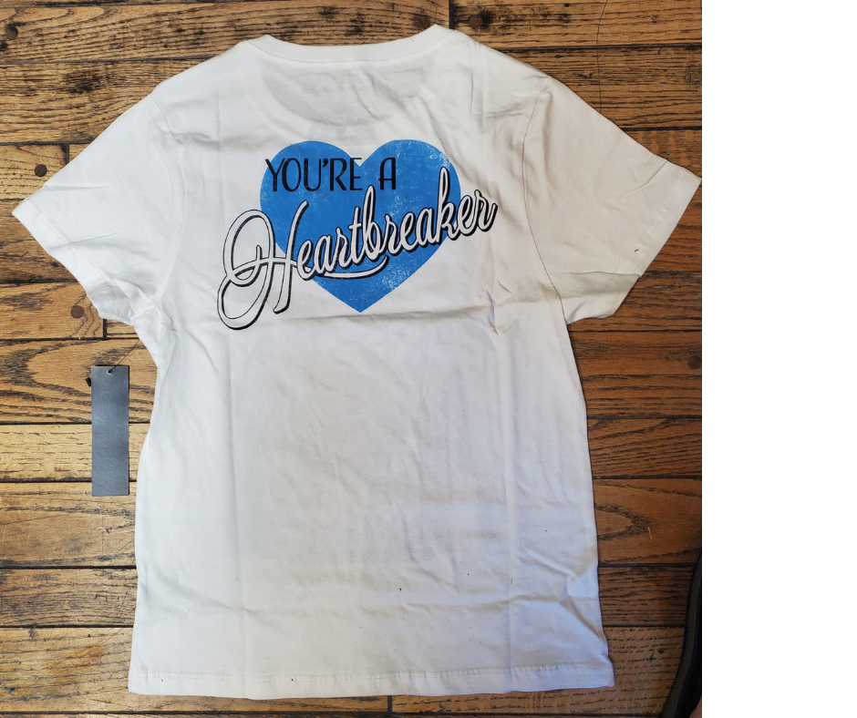 The Elvis Heartbreaker tee has those vintage style graphics. It'll take you back to those Comeback special and the cool Rhinestone Jumpsuits. Supper soft feel. A few left in stock at our Smyrna, TN shop.

Sizing measurements:
Chest under arm pit S-16", M-17", LRG 18", XL-19", 2X- 20"
Length top of neck to bottom of shirt S -24, M-25", L-26", XL-27", 2X-28"