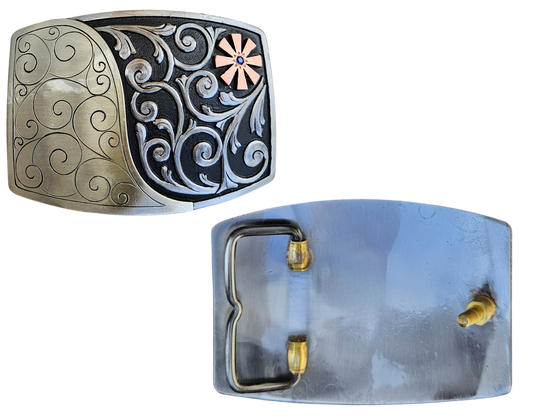 The Endless Breeze Belt Buckle has a more contemporary design accented with multi Scrolls divided into right and left colors and a Copper colored cog wheel on the top right. Made from German Silver and engraved and layered metals in a tri-color design. Available in our Smyrna, TN shop, a short distance from Nashville.

Dimensions: Width 4”, Height 2.7”
Standard 1.5” Swivel