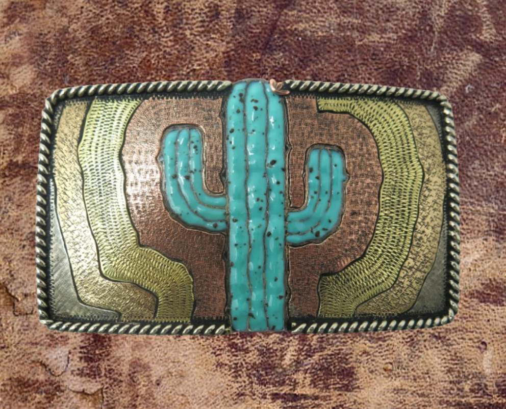 The El Cacto buckle is made from German Silver (nickel and brass alloy) or iron metal base. Each piece is punched, cut, soldered, engraved, polished and painted by our talented metal workers. In order to give you the quality and long lasting final product we also plate each piece with copper, nickel and silver to ensure the piece&