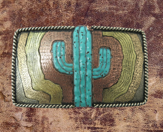 The El Cacto buckle is made from German Silver (nickel and brass alloy) or iron metal base. Each piece is punched, cut, soldered, engraved, polished and painted by our talented metal workers. In order to give you the quality and long lasting final product we also plate each piece with copper, nickel and silver to ensure the piece&