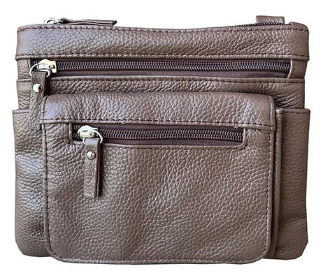 Out Everyday Crossbody Bag is simple. It can be used as a Crossbody bag with the included strap that easily clips on or off or clip it to your belt loops if you wear jeans a lot. A solid bag for the price. Stocked at our Smyrna, TN shop.

Choose from 5 Colors. Wine, Black, Blue, Dark Brown or Light brown