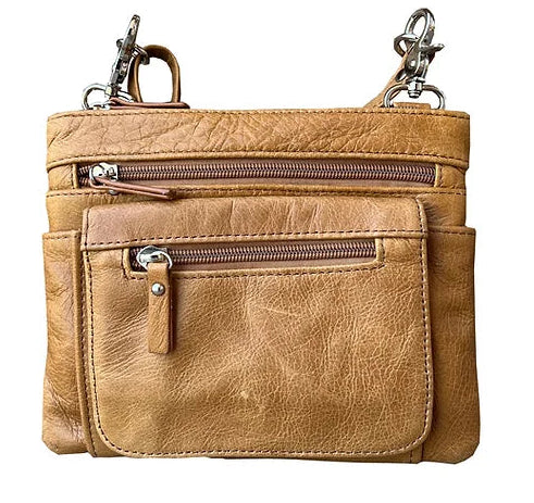 Out Everyday Crossbody Bag is simple. It can be used as a Crossbody bag with the included strap that easily clips on or off or clip it to your belt loops if you wear jeans a lot. A solid bag for the price. Stocked at our Smyrna, TN shop.

Choose from 5 Colors. Wine, Black, Blue, Dark Brown or Light brown