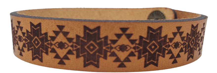 Assorted Southwestern style bracelet cuffs are made from laser engraved, premium, full grain leather, and finished with solid brass snap for a long lasting touch. It's comfortable and lightweight, making it great for everyday wear. 7 1/2 x 1/2 in. Stocked at our Smyrna, TN shop. 