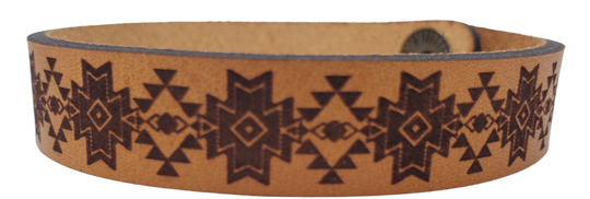 Assorted Southwestern style bracelet cuffs are made from laser engraved, premium, full grain leather, and finished with solid brass snap for a long lasting touch. It's comfortable and lightweight, making it great for everyday wear. 7 1/2 x 1/2 in. Stocked at our Smyrna, TN shop. 
