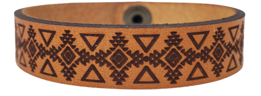 Assorted Southwestern style bracelet cuffs are made from laser engraved, premium, full grain leather, and finished with solid brass snap for a long lasting touch. It's comfortable and lightweight, making it great for everyday wear. 7 1/2 x 1/2 in. Stocked at our Smyrna, TN shop. 