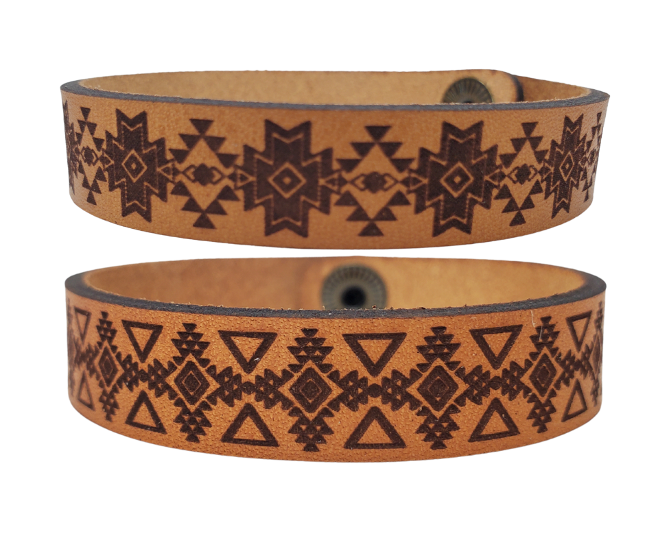Assorted Southwestern style bracelet cuffs are made from laser engraved, premium, full grain leather, and finished with solid brass snap for a long lasting touch. It's comfortable and lightweight, making it great for everyday wear. 7 1/2 x 1/2 in. Stocked at our Smyrna, TN shop. 