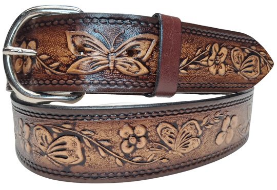 This stylish leather belt features beautiful flowers and butterfly artwork that is sure to draw attention. The easy-change metal buckle makes for comfortable wear and makes it easy to adjust for size. Perfect for adding a unique touch to any wardrobe. This belt is stocked in our shop outside Nashville in Smyrna, TN.