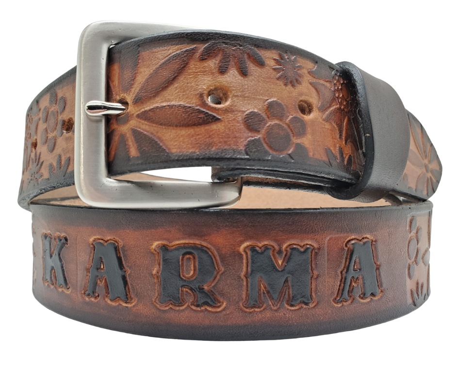 Our salute to Peace and Love "The Flower Child" is a handmade real leather belt made from a single strip of cowhide shoulder leather that is 8-10 oz. or approx. 1/8" thick. It has hand burnished (smoothed) & edges and summer flowers embossed in 3 color options. The antique nickel plated solid brass buckle is snapped in place with heavy snaps. This belt is made just outside Nashville in Smyrna, TN.