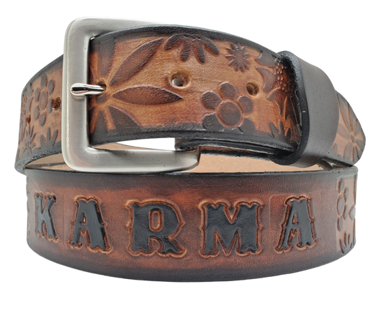 Our salute to Peace and Love "The Flower Child" is a handmade real leather belt made from a single strip of cowhide shoulder leather that is 8-10 oz. or approx. 1/8" thick. It has hand burnished (smoothed) & edges and summer flowers embossed in 3 color options. The antique nickel plated solid brass buckle is snapped in place with heavy snaps. This belt is made just outside Nashville in Smyrna, TN.
