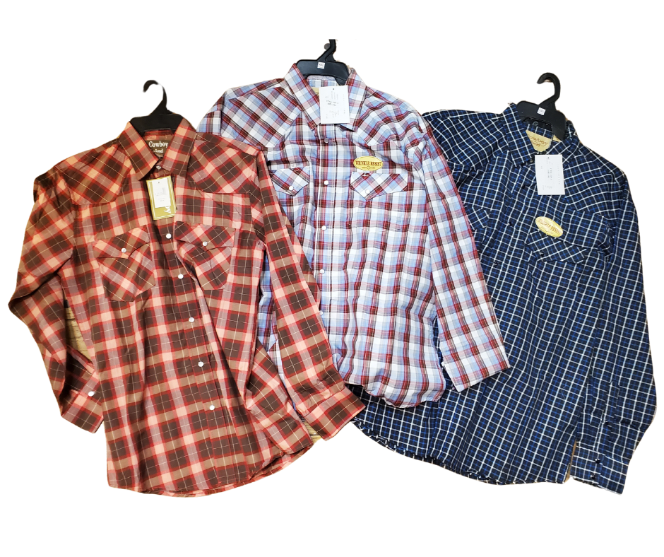 It doesn't get much anymore classic than a plaid pearl snap western shirt. Complete with two front flap pockets, pearl snap details in the vintage plaid pattern. These never go out of style, always a in style! Available in our Smyrna, TN shop just outside Nashville. Imported

Note: the Plaid colors Blue, Red, and Brown, or Black will always be the base color BUT the tones may change occasionally. The yokes ,snaps will be the same as well.

Details: Snaps, 2 Pockets, Yokes