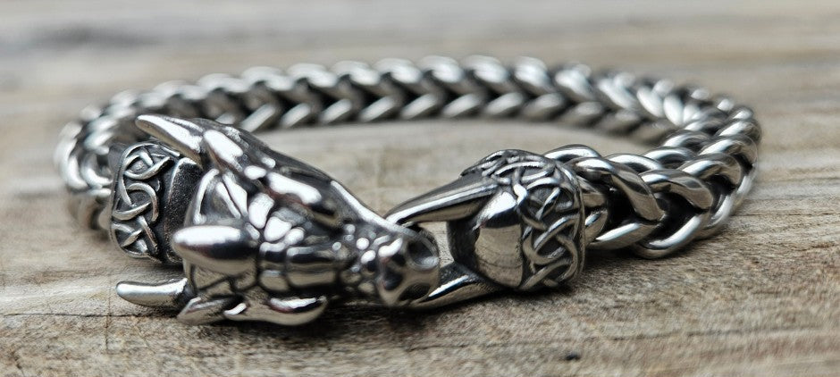 Wear The Franco Dragon and get your Viking attitude happening! The bracelet has ornate Norse style braid that connects the Dragon head and loop together. Made in durable long lasting Stainless Steel for many years of use. In stock at our Smyrna, TN shop not far from wild downtown Nashville.

8.5"L X 5mm W Stainless Steel