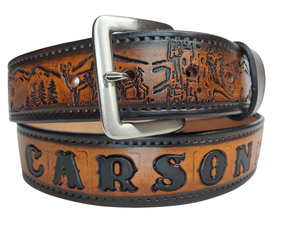 Our Frontiersman is named after the well known men who explored the original USA Frontier. This leather belt is crafted from high-quality Veg Tan cowhide and comes in four different color options. The edges are smooth and hand finished with a Deer and Squirrel outdoors scene. It's 1 1/2" wide, and available in sizes 34" to 44".  The removable Brushed Nickel plated solid brass buckle is attached with two snaps. Handmade in our Smyrna, TN, USA shop, just a short trip from Nashville.