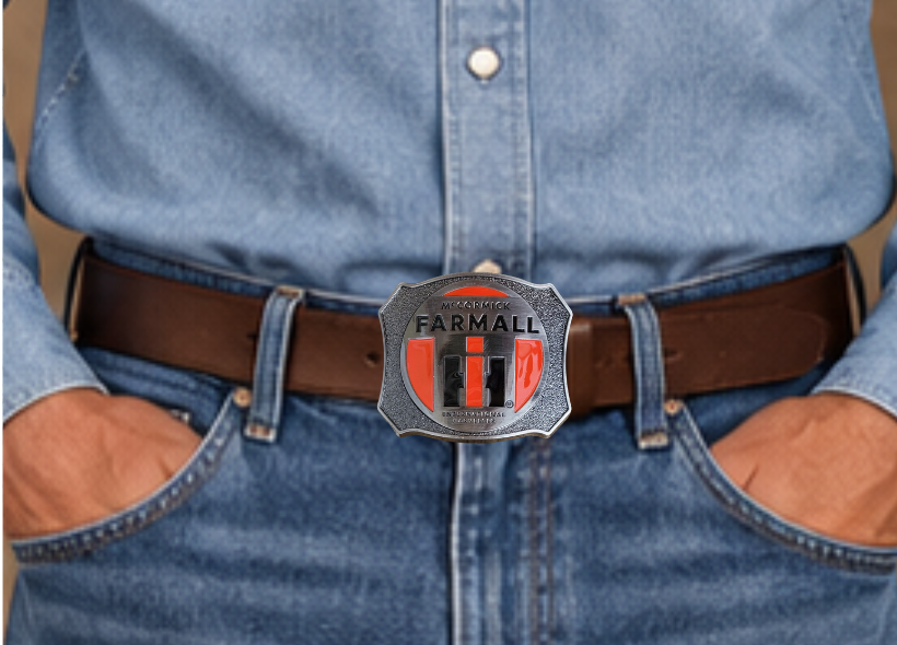 Farmall International Harvester Belt Buckle, Shield shaped with classic logo in Red, Black on antique Silver background. Size approx. 3 3/4" wide x 2 3/4" height, Fits up to 1 1/2" wide belts. Available in our shop in Smyrna, TN just outside Nashville as well as from this online store.