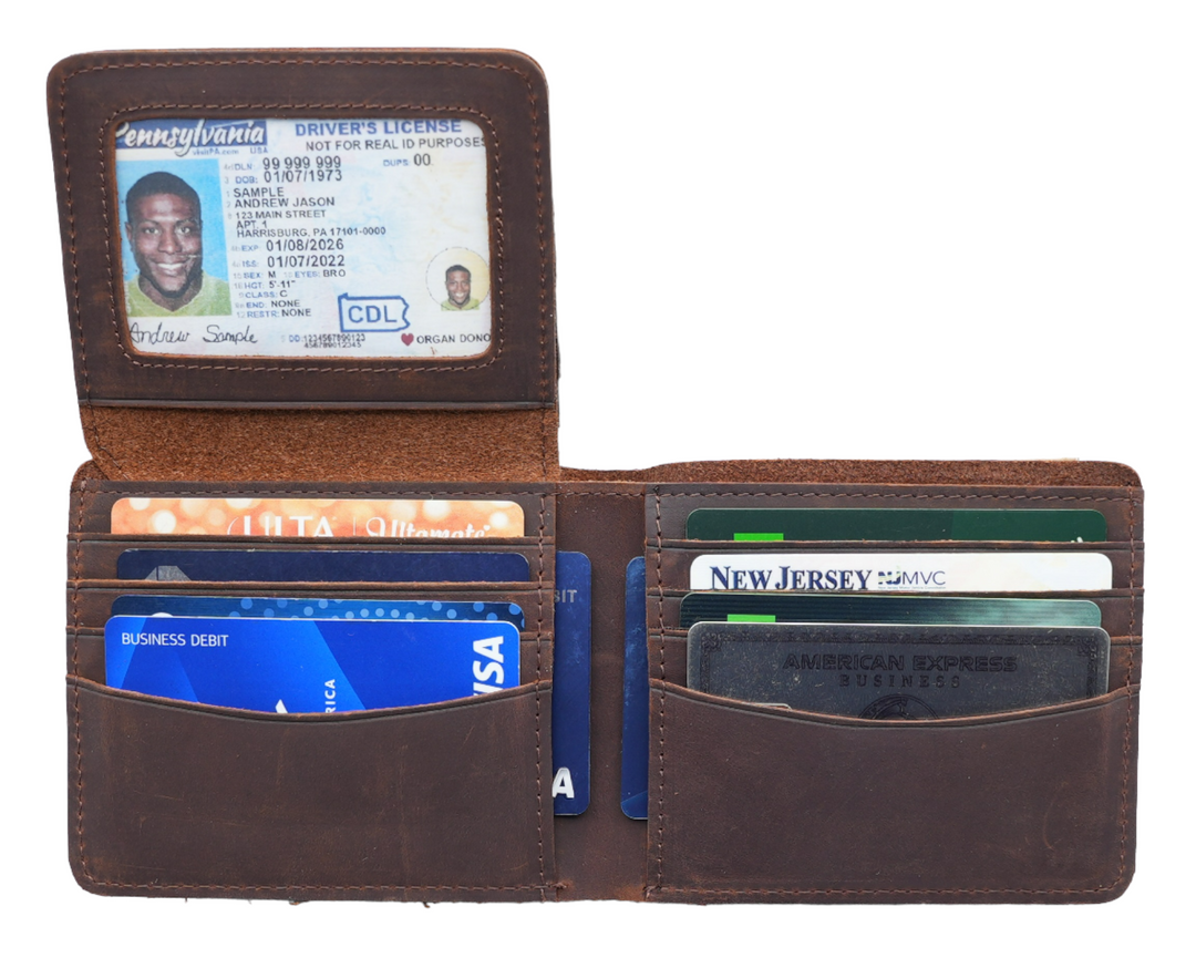 Our USA Made Garrison Leather Wallet for Men. Made slim which isn't easy to do for a real leather wallet. Has all the slots for the cards you need for your daily use. Plus it has RFID for protection from scammers. Now in stock at our Smyrna, TN shop not far from the Gulch area in Nashville.

With Flap Out ID Window Holder
Handcrafted, Strong Stitching
Extra Capacity for bills
14 Card Slots
Gift for Him