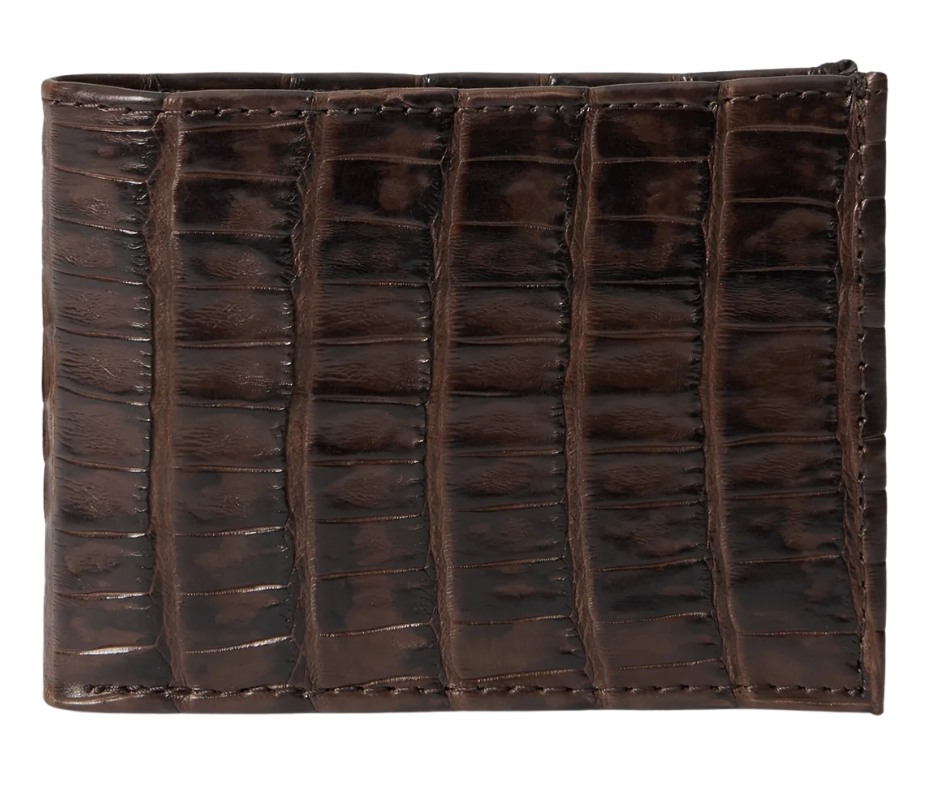 Made from authentic Classic Black or Cigar Brown Caiman leather, this bi-fold wallet blends classic western flair with luxurious materials that turn heads. True to Stetson’s legendary dedication to quality and craftsmanship, it offers 6 card slots, 2 hidden pockets underneath, and a spacious cash compartment. Available now at our Smyrna, TN store, just a short drive from downtown Nashville. Proudly made in Mexico.
