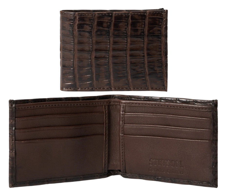 Made from authentic Classic Black or Cigar Brown Caiman leather, this bi-fold wallet blends classic western flair with luxurious materials that turn heads. True to Stetson’s legendary dedication to quality and craftsmanship, it offers 6 card slots, 2 hidden pockets underneath, and a spacious cash compartment. Available now at our Smyrna, TN store, just a short drive from downtown Nashville. Proudly made in Mexico.