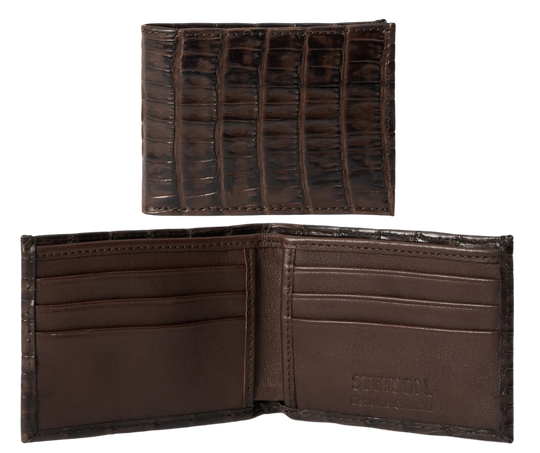 Made from authentic Classic Black or Cigar Brown Caiman leather, this bi-fold wallet blends classic western flair with luxurious materials that turn heads. True to Stetson’s legendary dedication to quality and craftsmanship, it offers 6 card slots, 2 hidden pockets underneath, and a spacious cash compartment. Available now at our Smyrna, TN store, just a short drive from downtown Nashville. Proudly made in Mexico.