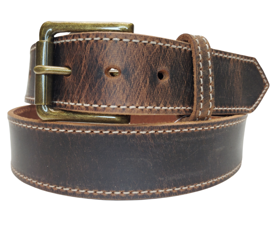 Named after the dusty trail used to herd cattle in the 1880's. This belt has the distressed look that matches so many of todays popular boots. The stitching gives just a hint of a dressed up look, it will become your go to belt for everyday use. The Antique Brass roller buckle and 1 1/2" width will work most every type of pants. Snaps make a easy buckle change for your favorite buckles. Pick yours up at our Smyrna, TN shop open 5 days a week Tue. thru Sat 9-5. Made in USA.