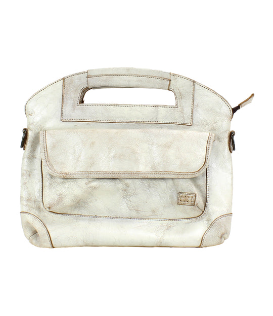 The Greenway Handbag, streamlined carry with security built in. Crafted from Artisan full-grain, vegetable-tanned leather. Reinforced dual top handles and a removable crossbody strap. Outside has a zip pocket and a magnet closure pouch. Secure zip-top closure. Inside organic cotton lining with two slip pockets, one zip pocket, and a key leash.  Made by Bed/Stu and now stocked at our Smyrna, TN store.

Measurements: 12" L x 10.25" H
Handmade and hand-finished in León, Mexico