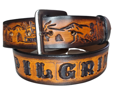 "The GRIZZLY" is our tribute to the "Pilgrim" Jeremiah Johnson! It's a professionally crafted, genuine leather belt made from 8-10 oz cowhide shoulder leather, approximately 1/8" thick. It boasts a hand burnished edge, along with a multi-step dye and finishing technique. The antique nickel plated solid brass buckle is affixed with heavy snaps. This belt is crafted near Nashville, TN in Smyrna.
