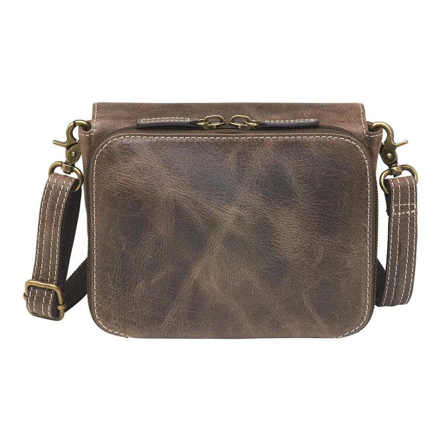 This Compact Crossbody Organizer from Gun Toten' Mama is a low profile Conceal Carry purse with enough space for just the essentials.
Get yours at our Smyrna, TN store not far from Nashville.


Tooled cowhide shows a rose leaf pattern offered in Black, Tan, or Red.
The distressed brown shows a smooth Buffalo leather.
Flap closes with a Rare Earth Magnetic Closure.
Slot and zippered lining pockets.
Pen slot.
Adjustable Slash Resistant Shoulder Strap that easily clips on and off.

Strap length 25" to 49