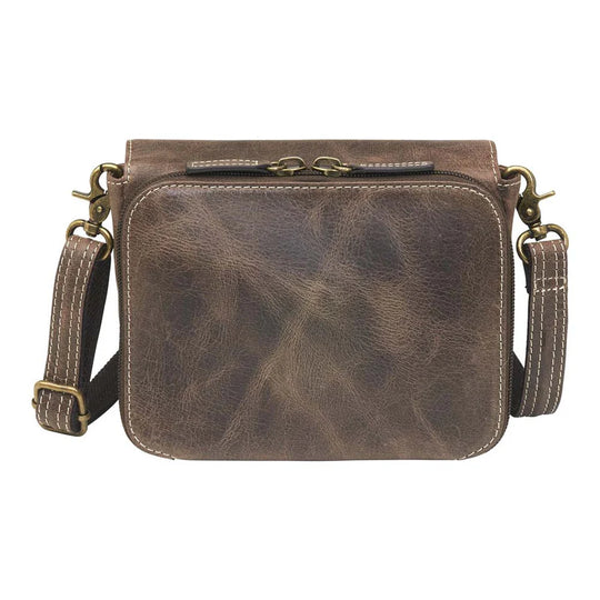 This Compact Crossbody Organizer from Gun Toten' Mama is a low profile Conceal Carry purse with enough space for just the essentials.
Get yours at our Smyrna, TN store not far from Nashville.


Tooled cowhide shows a rose leaf pattern offered in Black, Tan, or Red.
The distressed brown shows a smooth Buffalo leather.
Flap closes with a Rare Earth Magnetic Closure.
Slot and zippered lining pockets.
Pen slot.
Adjustable Slash Resistant Shoulder Strap that easily clips on and off.

Strap length 25" to 49