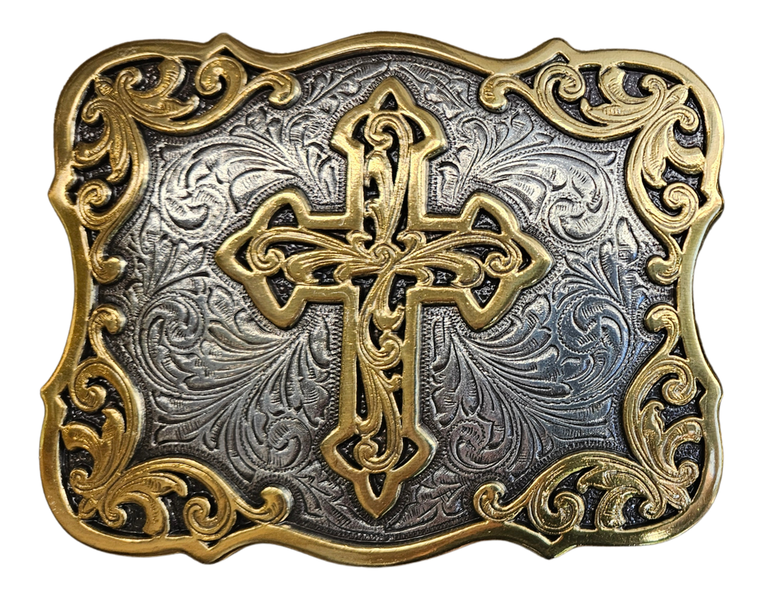 Adorn your wardrobe with the Gilded Santa Fe Cross buckle. An ornate, Southwest influenced, western-style scroll and Cross gilded with antique brass color accents on an antique silver color engraved background. It measures approx. 3" X 4" and will fit up to a 1 1/2" belt. It can be found both online and in our shop in Smyrna, TN, near Nashville.
