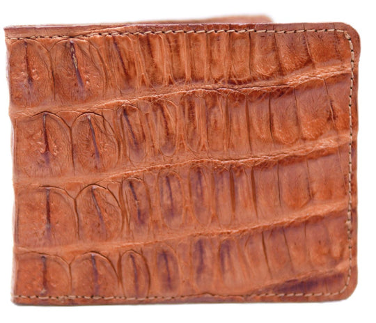 If you appreciate craftmanship this USA Made Genuine Hornback Crocodile Bifold will do the trick. Genuine Ostrich Lining is complete with matching Leather Lining, 1 Bill Pocket, 8 Card Slots, 2 Inner Side Pockets. Each hide is unique, each wallet is unique! Handmade in USA and sold in our Smyrna, TN shop not far from the gulch downtown Nashville.

Thin profile