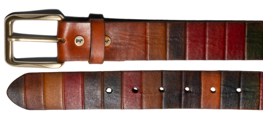 Artisans in Turkey handcraft our heavy-weight, full grain Italian vegetable-tanned leather to create our Rectangle Cut belt. The belt is artfully scored by hand to create dark lines that recall the ancient craft of leather bookbinding. A heavy-weight harness buckle in an Old English Brass finish compliments the rich cognac color of the leather. Built to last a lifetime, our Rectangle Cut Belt. Get fitted at our Smyrna, TN shop not far from Murfreesboro. From Will Leather.