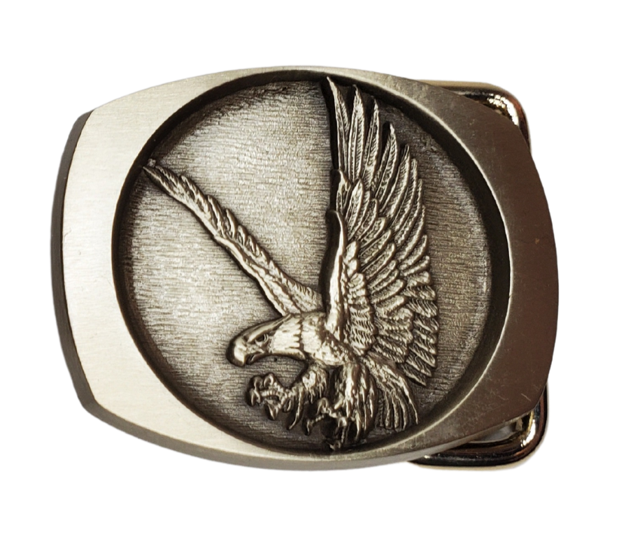 Rectangle shaped antique Bronze belt buckle with  Flying Eagle.  Available online and at our shop just outside Nashville in Smyrna, TN.   Made in USA CAST Solid Bronze fits 1" or 1 1/4"" belts. Genuine apparel for men and women SIZE 2.5" x 2.5". Newly manufactured belt buckle using 1970's-1980's molds.