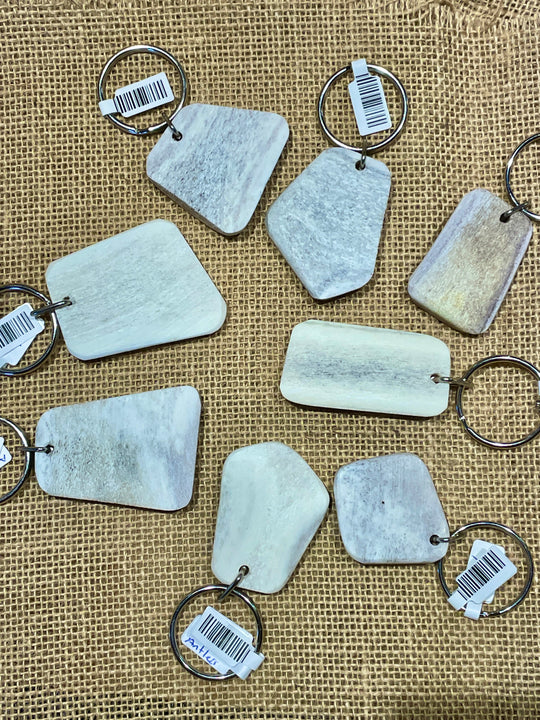 Handcrafted antler key chains featuring a variety of inlays. Made from naturally shed elk and deer antlers. Made in the U.S.A. Get yours at our Smyrna, TN shop not far from Franklin.